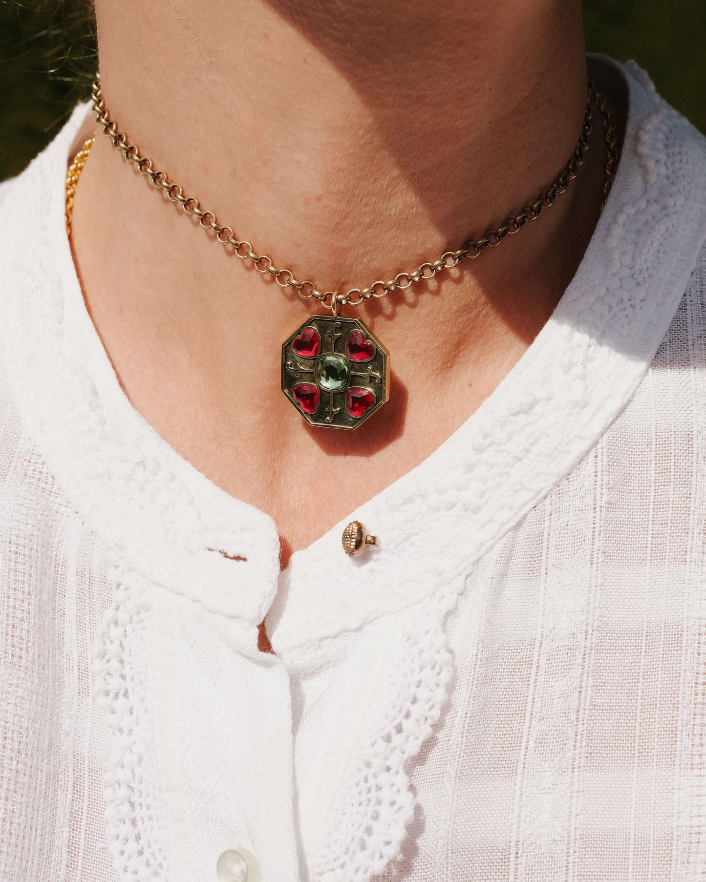 Heart Garden Pendant with peridot-coloured cushion-cut crystal and delicate floral heart stones, art deco inspired jewelry, exclusive jewellery.