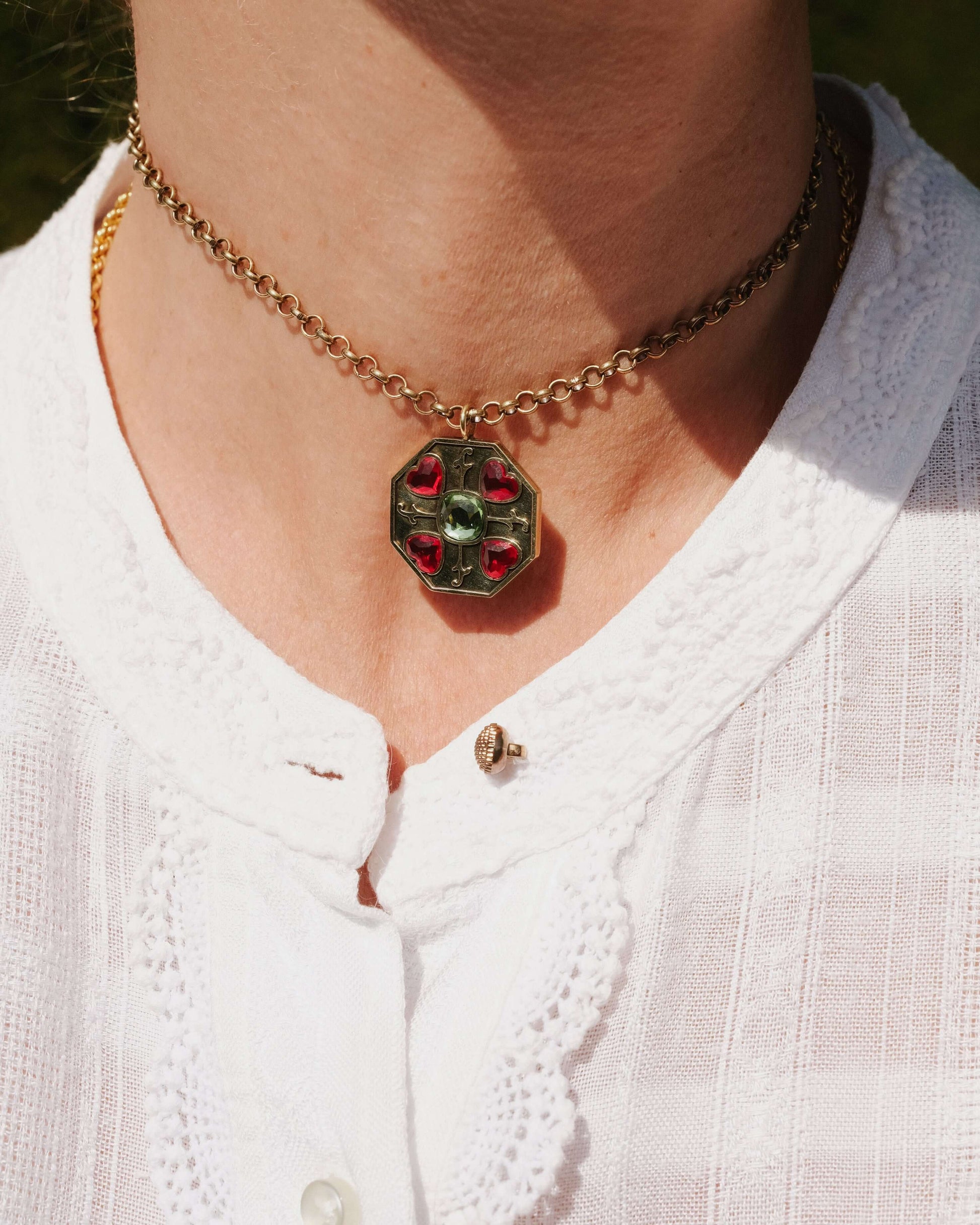 Heart Garden Pendant with peridot-coloured cushion-cut crystal and delicate floral heart stones, art deco inspired jewelry, exclusive jewellery.